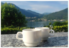 LFSUITE LuganoLake Terrazza Spiaggia privata Parking WI-FI Netflix Corrido